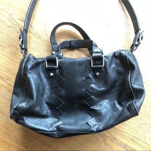 Pour La Victoire black leather cross body bag.